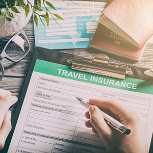 Why is it important to have travel insurance while traveling to move abroad